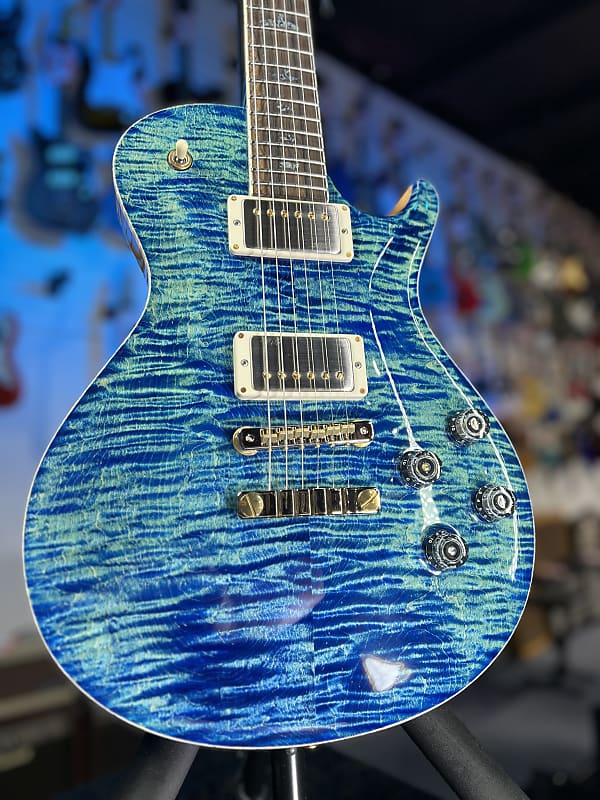 PRS Wood Library McCarty Singlecut 594, River Blue with Matching Stained Maple Neck, Natural Back, Hybrid Hardware, Paisley Case, Signature Dealer 365