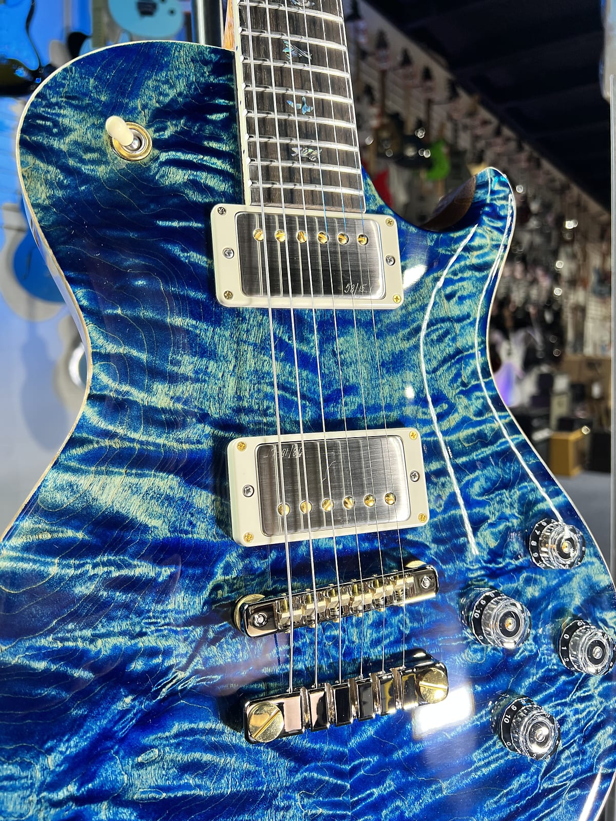 PRS Wood Library McCarty Singlecut 594, Quilt Top, River Blue, Ziricote Fingerboard, Paisley Case, Signature Dealer 454