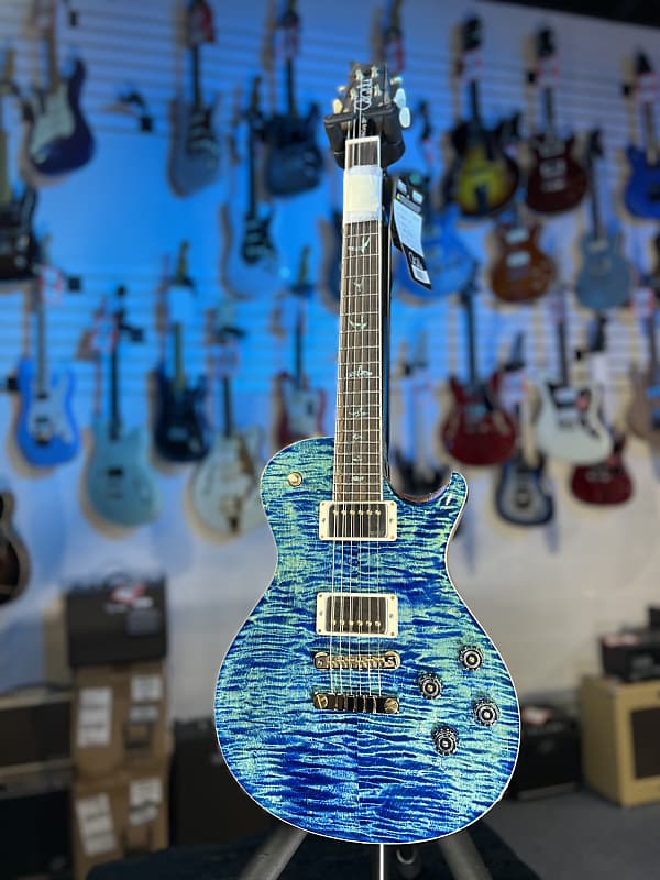 PRS Wood Library McCarty Singlecut 594, River Blue with Matching Stained Maple Neck, Natural Back, Hybrid Hardware, Paisley Case, Signature Dealer 365